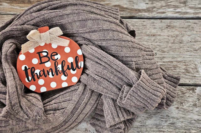 A decorative pumpkin with the words 